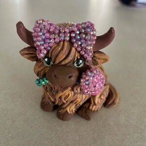 Cow with the sparked pink bow